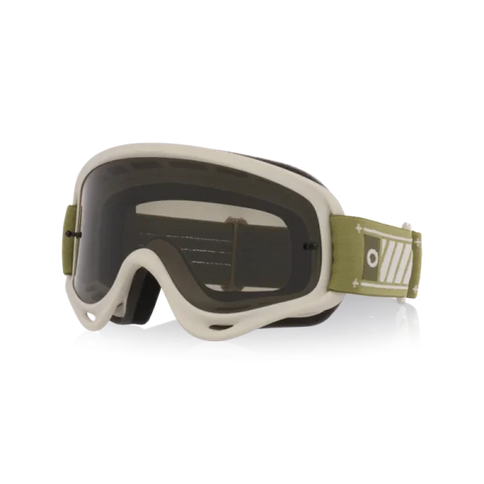 Oakley O-Frame MX Fern Hazard goggles with dark gray lenses, designed for motocross riding, shown from an angled view.