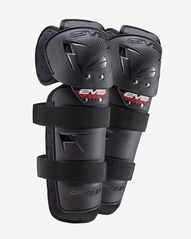 Pair of EVS Option Knee Guards showing black protective knee pads with adjustable straps for motocross or biking.