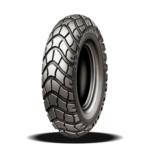 Michelin Reggae motorcycle tire 120/90-10 showing tread pattern and sidewall detail on a black background.
