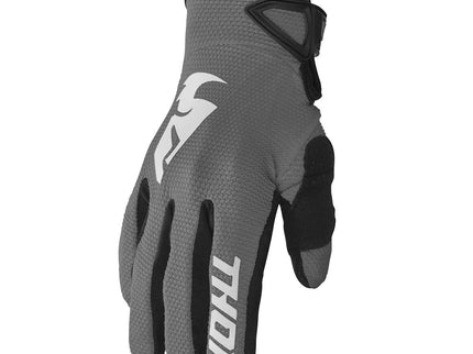 Grey THOR Sector YTH MX gloves shown on hands, featuring padded knuckles and breathable fabric for youth motocross riding.