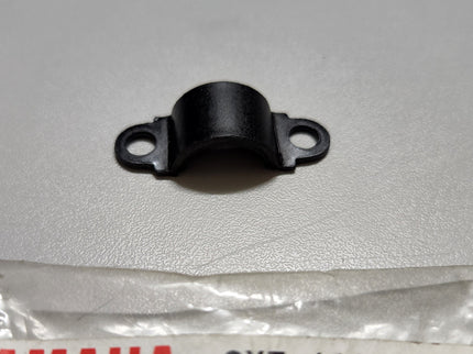 Yamaha 1990 TZR250SP OEM joint part, close-up view showing the detailed rubber and metal components.