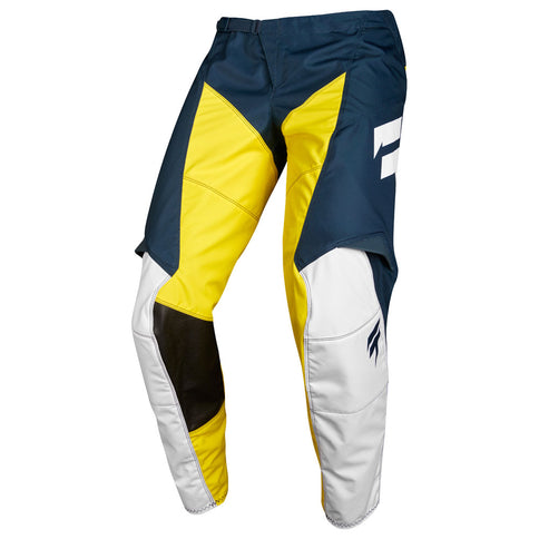 Shift WHIT3 LABEL GP LE MX pants in navy and yellow, featuring durable fabric and sporty design for motocross riding.