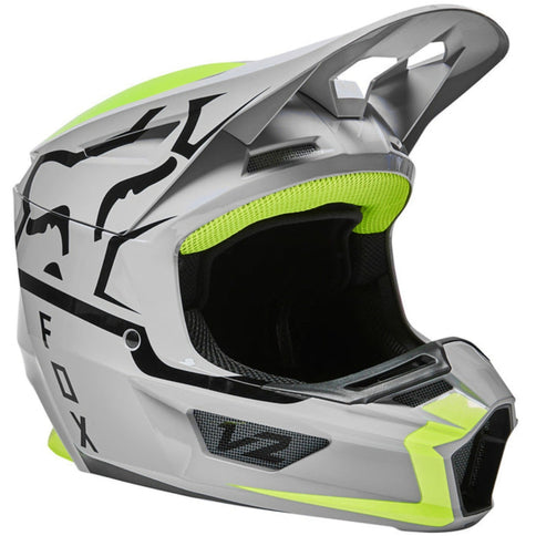 FOX V2 MERZ Grey MX helmet with sleek grey design and ventilation vents, designed for motocross riding.