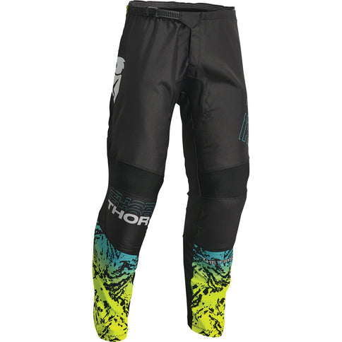 THOR SECTOR Atlas MX pants in black and teal with padded knee protection and adjustable waist for motocross riding.