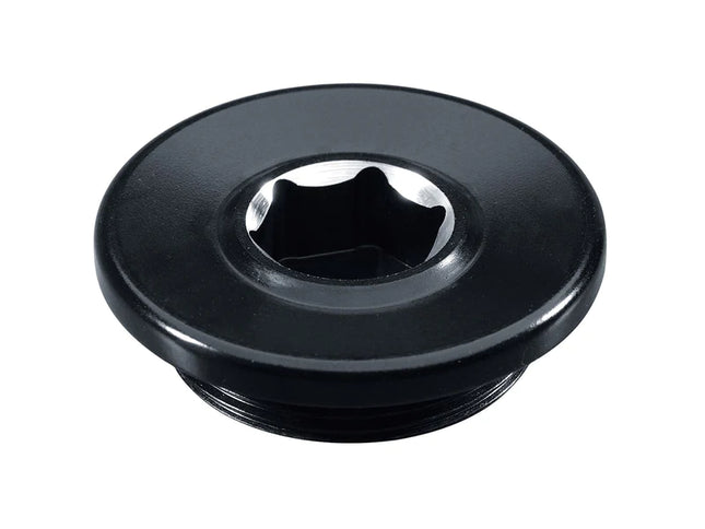 Black GYTR engine cover plug for Yamaha, shown installed on motorcycle engine, durable and precisely fitted for Yamaha models.