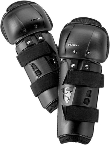 Black THOR SECTOR adult knee guard showing padded knee protection with adjustable straps for secure fit.