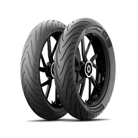 Michelin Pilot Street 180/55-17 motorcycle tire showing tread pattern and sidewall detail on a white background.