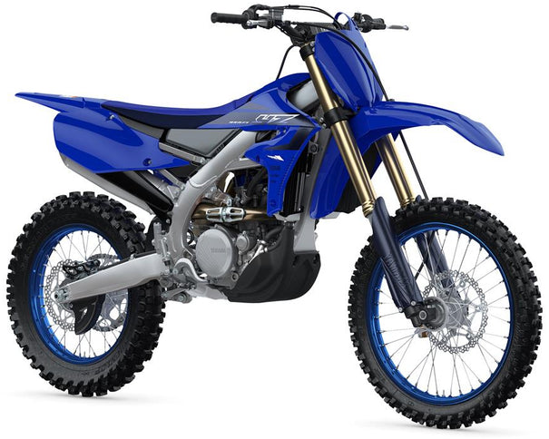 Yamaha YZ250FX dirt bike with blue frame, knobby tires, and off-road suspension ready for motocross racing.