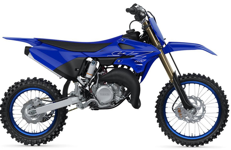 Yamaha YZ85 motocross motorcycle with blue and white body, off-road tires, and sporty design.