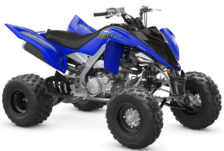 Yamaha RAPTOR 700 ATV in bright yellow with large off-road tires and rugged suspension, ready for outdoor adventures.