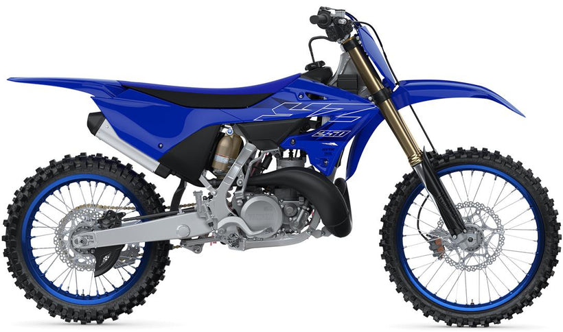 Yamaha YZ250 motorcycle with black and yellow body, off-road tires, and racing design, ready for motocross riding.