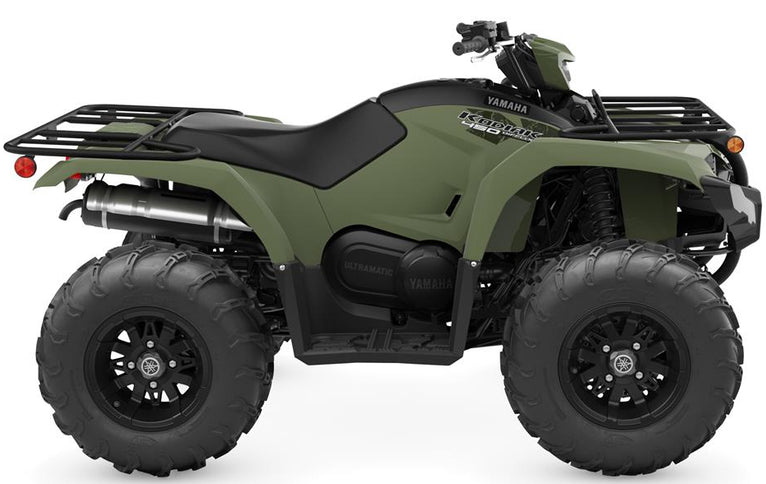 Yamaha Kodiak 450 EPS ATV with rugged tires, front and rear suspension, and a durable green body suitable for off-road adventures.