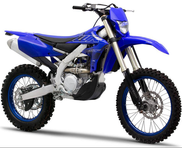 Yamaha WR450F off-road motorcycle with rugged tires and sporty design, ready for dirt trail riding.