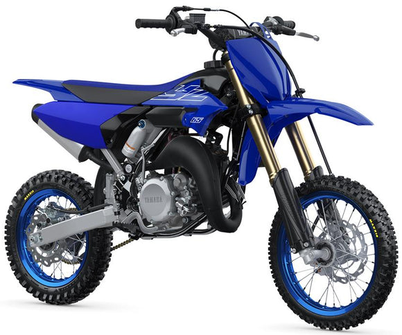 Yamaha YZ65 motocross motorcycle with blue and white body, off-road tires, and racing design, front view.