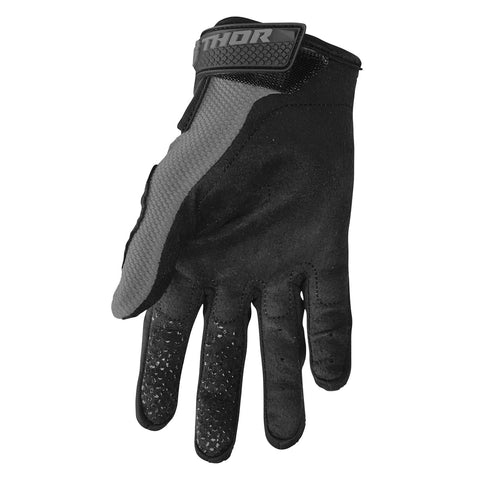 Gray THOR SECTOR MX gloves shown on hands, featuring durable construction and protective padding for motocross riding.