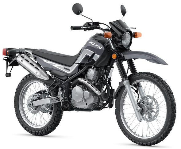 Yamaha XT250 motorcycle with black body and off-road tires, parked outdoors on a clear day.